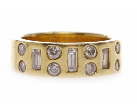 EIGHTEEN CARAT GOLD DIAMOND SET BANDset with round brilliant cut diamonds interspaced by baguette cut diamonds, the diamonds 