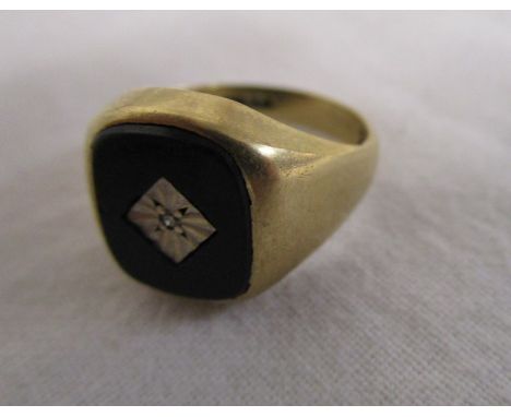 Gold gents onyx &amp; diamond set ring