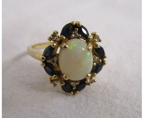 Gold opal and sapphire set ring