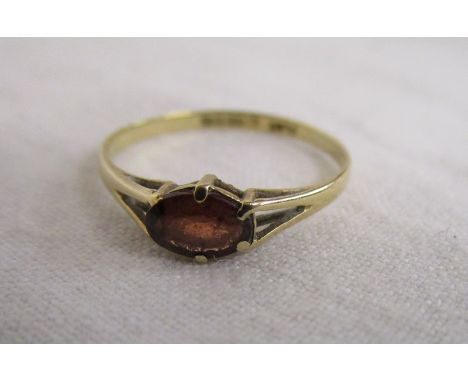 Gold garnet set ring