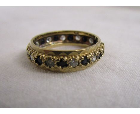 Gold sapphire full eternity ring