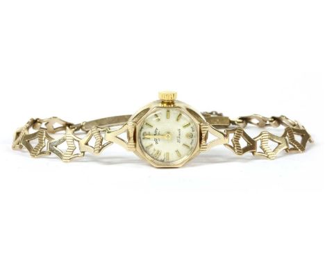 A ladies' 9ct gold Rotary mechanical bracelet watch, silvered dial with baton hour markers and Arabic numerals at '12' and '6