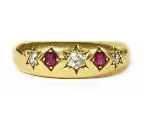 A Victorian 18ct gold diamond and ruby five stone ring, with a graduated row of alternating old European cut and old eight cu