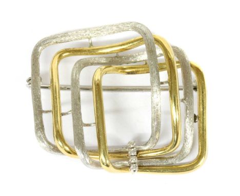 An 18ct gold diamond brooch, with openwork overlaid polished yellow gold squares and textured white gold squares, with a row 