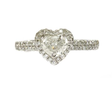 A white gold heart cut diamond halo cluster ring, a heart cut diamond, with a stated weight of 0.43ct, claw set and surrounde