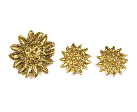 A Chanel gold-plated lion brooch and earrings suite, the brooch in the form of a lion's head and mane, with a border of Chane