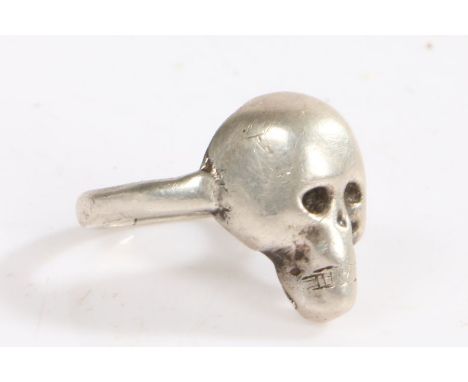 A silver skull ring, the head in the form of a skull, ring size S weight 12.1 grams&nbsp;