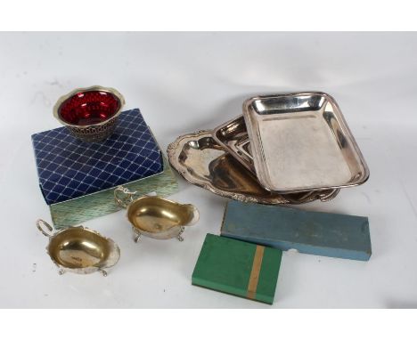 Silver plated ware to include tureen and cover, serving dish, pair of sauceboats, sugar bowl with ruby glass liner, condiment