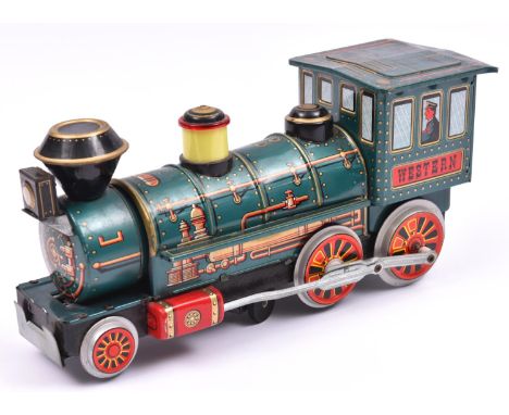 A 1960's Japanese Modern Toys battery powered tinplate American style locomotive. 32cm overall length, litho detailed in dark