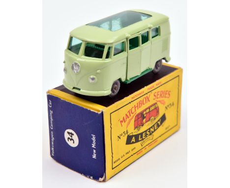 Matchbox Series Volkswagen Camping Car No.34. In light green with green windows, grey plastic wheels with a dark green base. 