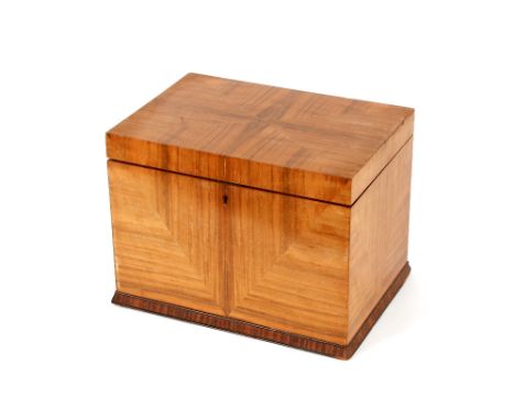 An Art Deco walnut trinket box, the radially veneered hinged top inset to the interior with a brass monogrammed cartouche, pa