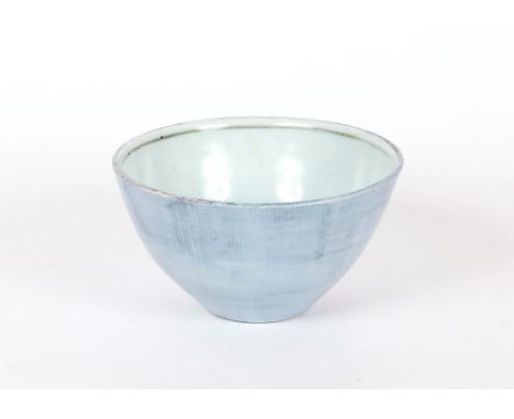 Style of Bernard Leach, a Studio Pottery bowl, the interior decorated with deer, pale blue with lined border, 18cm dia. x 9cm