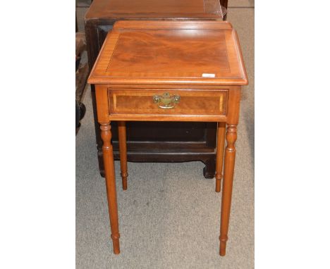 A pair of mahogany and cross banded lamp tables, fitted single drawers, raised on turned tapering legs, 49cm wide x 78cm high