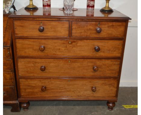 A 19th Century mahogany chest, fitted two short and three long graduated drawers raised on turned supports, 110cm wide, (one 