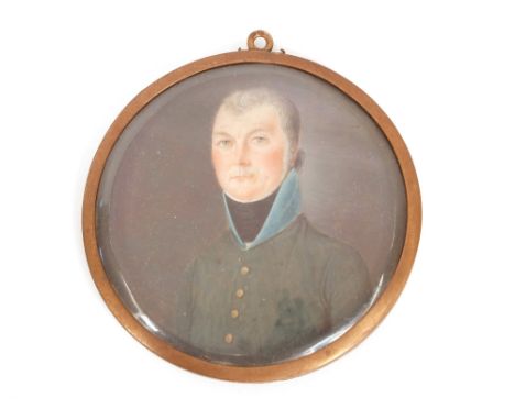 19th Century school, portrait study of a gentleman wearing buttoned coat and stock, contained in circular brass frame, with m