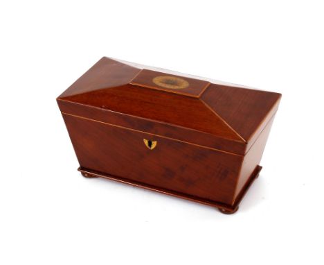 A 19th Century mahogany boxwood strung and inlaid sarcophagus shaped tea caddy, raised on bun feet (original interior missing