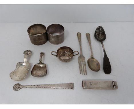 A collection of silver items, including caddy spoons, napkin ring, cutlery, salt spoon and sealing wax holder. Longest 13.5cm