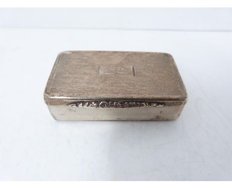 Georgian silver snuff box with engine turned decoration and central rectangular cartouche, floral details to the front. Hallm