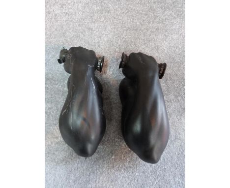 A pair of vintage black painted ceramic muscle men wall lights. The light bulbs represent the end of the dumbells. H 33. 