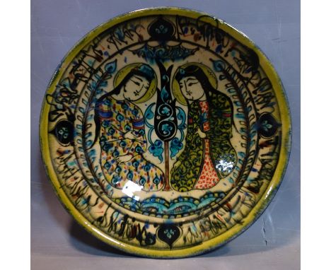 A Persian glazed ceramic bowl, made in Tehran, date and makers mark to reverse, depicting a Persian love story of the Sasania