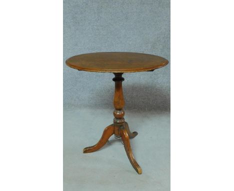 A 19th mahogany oval topped lamp table on turned tripod support. H.73 W.66 D.45cm