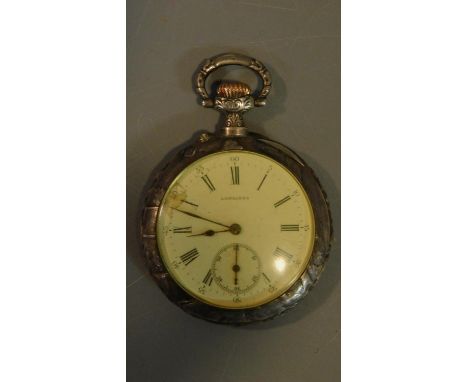Antique white metal Longines pocket watch with a relief Dutch hunting scene to the back. Hinged hanging loop engraved with a 