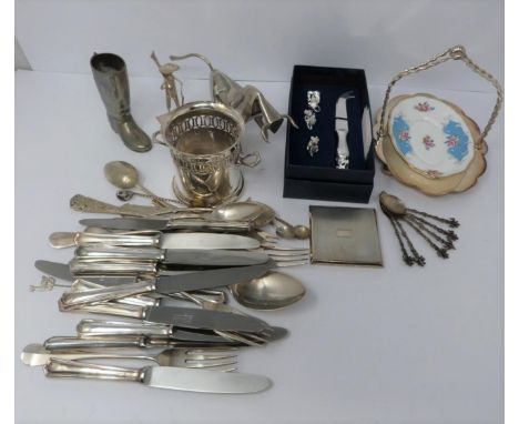 A collection of silver plate, including a white metal Oriental man and a bull, boot toothpick holder, ceramic basket, cheese 