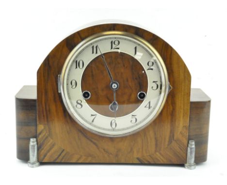 An Art Deco Haller Westminster Chime walnut mantel clock, in arched rectangular case, with chrome stepped feet, 22 cm high 