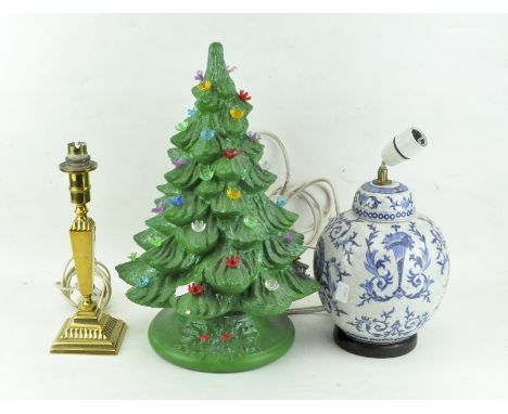 Three various table lamps, comprising: a brass candlestick-shaped example, a Chinese-style ginger-jar and cover printed with 