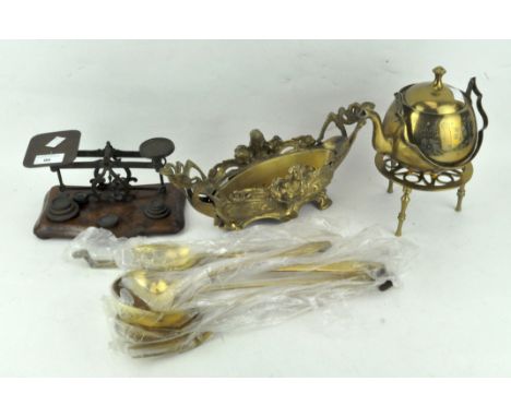A set of scales and other brassware, including a companion set and a kettle