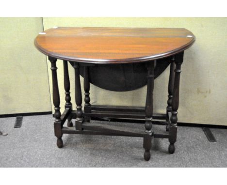 A mahogany gate leg dining table, 74cm x 90cm x 115cm 