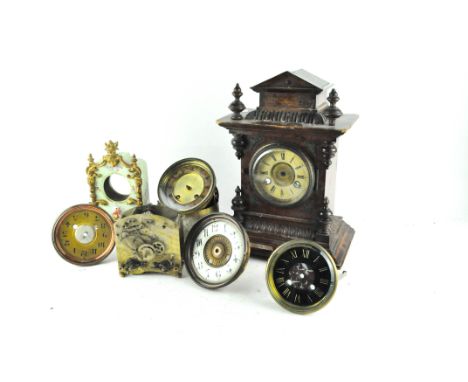 An oak cased mantel clock; together with various other movements and dials