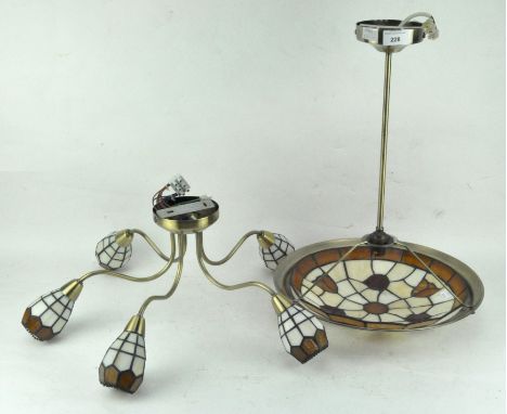 Two Tiffany style lights, one being a five branch chandelier, the other a hanging ceiling light