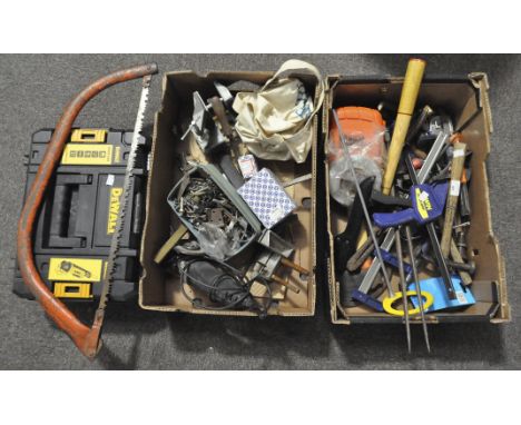 A collection of assorted tools, in boxes, to include an angle grinder, hand axes and others