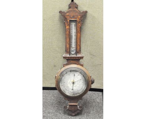 An early 20th century oak banjo cased aneroid barometer, with thermometer, 83cm high