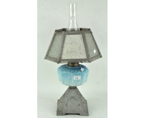 A Victorian oil lamp, cast metal base with opaline style glass reservoir, shade and glass funnel, 58cm high