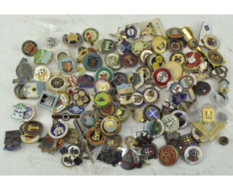 A collection of assorted enamel bowling badges of various designs