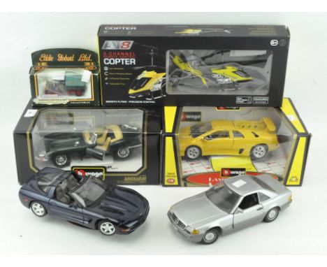 A collection of toy and model cars, including: Burago Jaguar, AV8 helicopter, Corgi Eddie Stobart and other items, some boxed