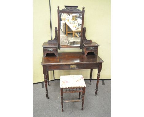 An Edwardian dressing table with mirror, 165cm x 107cm x 50cm; together with a stool