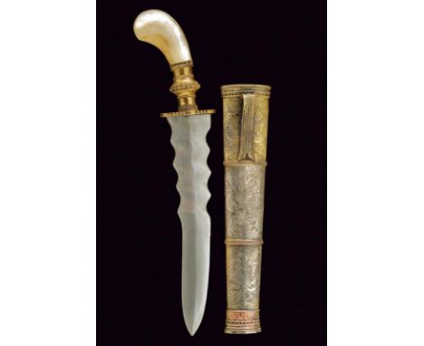 dating: early 20th Century provenance: Indonesia, Slightly curved, undulated, double-edged blade, ribbed in the center; mothe