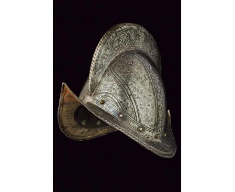 dating: 16th Century provenance: Italy, Skull in one piece with medium-high comb and twisted border, sloping brim with border