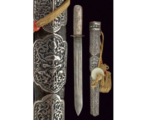 dating: 19th Century provenance: Tibet, Straight, single-and false-edged blade with thin, central groove, grip covered with s