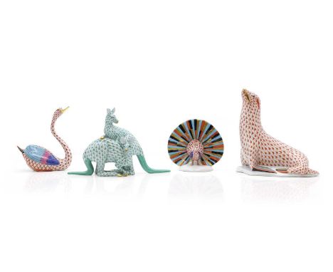 A group of Herend porcelain animals, comprising a seal, 18cm high, a swan, 14cm high, two kangaroos, 21cm wide, 14cm high, an