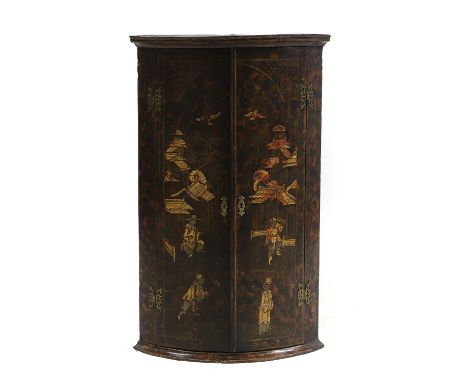 A Georgian japanned bow front hanging corner cupboard 58cm wide35cm deep93cm high, and a japanned urn shaped side cabinet, wi