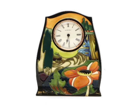 A Moorcroft pottery 'Ryden Fields' pattern timepiece, designed by Emma Bossons, dated 2006, impressed marks, boxed,21cm highC