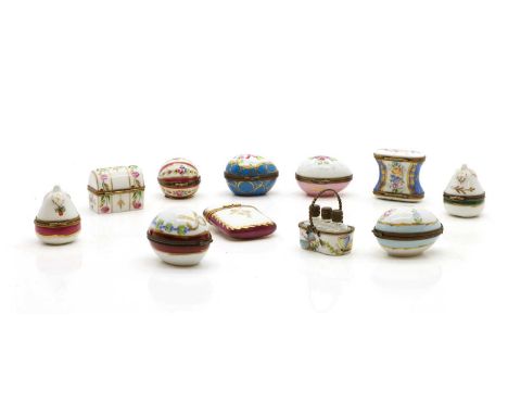 A collection of Limoges porcelain pill boxes and similar, various shapes, to include a basket form example, and egg shaped ex