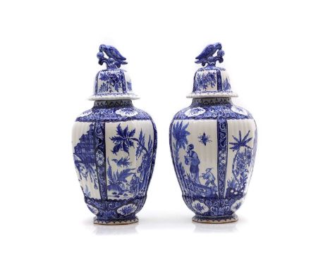 A pair of Delft vases and covers, 19th century Dutch, of baluster form with blue and white chinoiserie decoration 44cm highCo