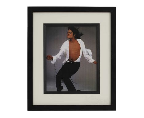 Michael Jackson, a signed 10 x 8in photograph, mounted and framed, with Fraser's Certificate of Authenticity