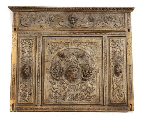 A Continental carved panel, 19th century, with carved strapwork and stiff leaves, the three panels centred with busts, 90 x 1