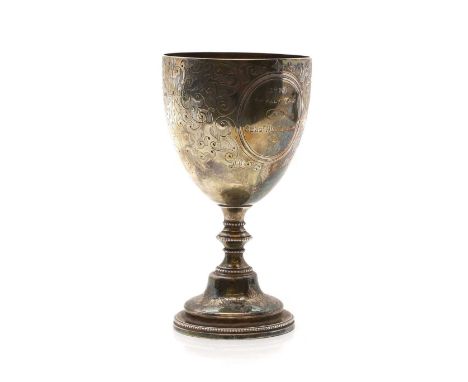 A silver trophy cup, by Daniel &amp; Charles Houle, London 1861, with chased foliate decoration, with engraving '1863 Challen